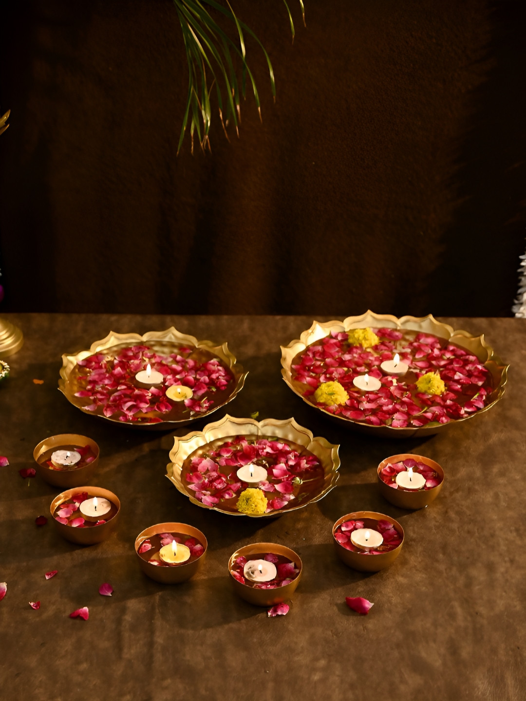 Aapno Rajasthan Gold Toned 9 Pieces Metal Urli & Candle Holders