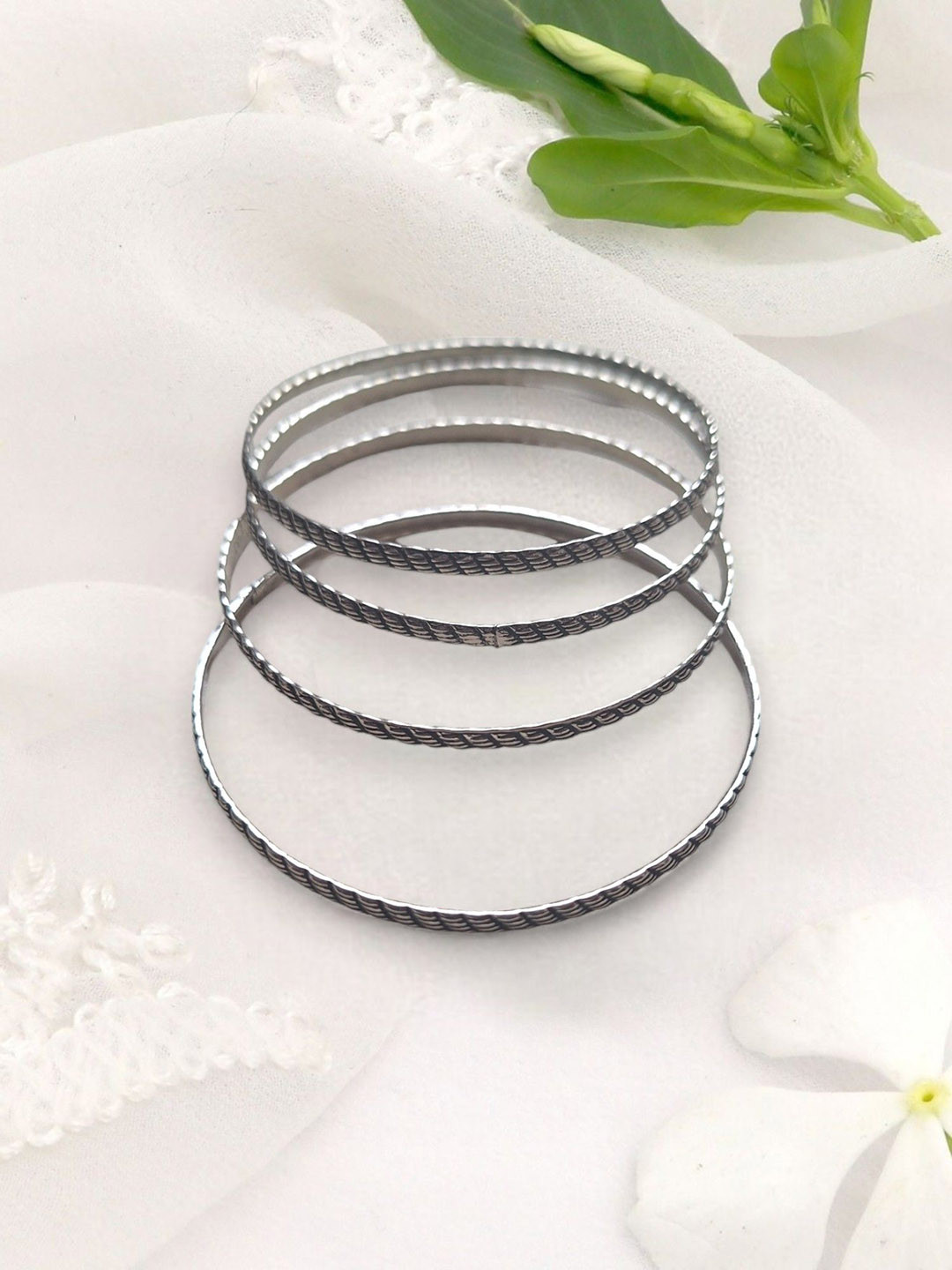 XAGO Le Apeksha Set Of 4 Silver Plated Oxidized Bangles