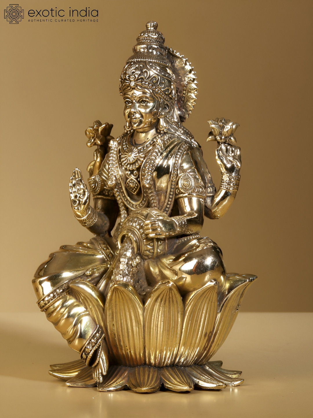 Exotic India Goddess Dhanlakshmi Gold Brass Metallic Prayer Room Small Showpiece - 7.5 Inches