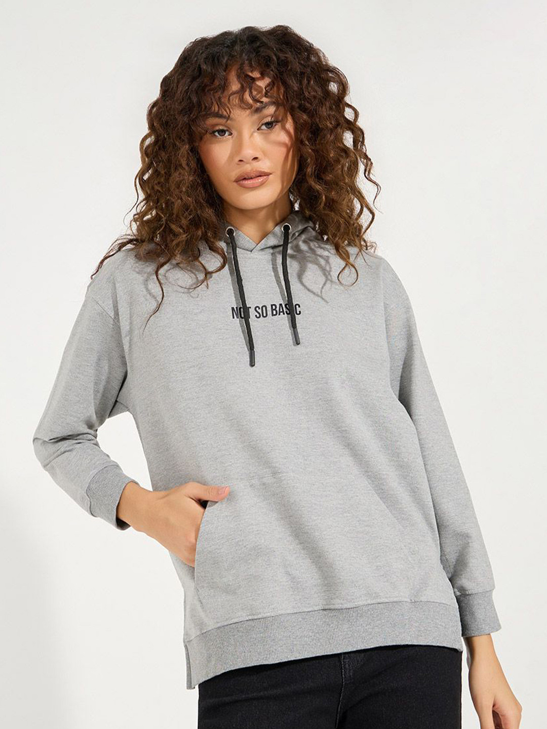 Styli Women Typography Printed Oversized Fit Long Line Casual Pullover Hoodie With Side Slit- Hoodie