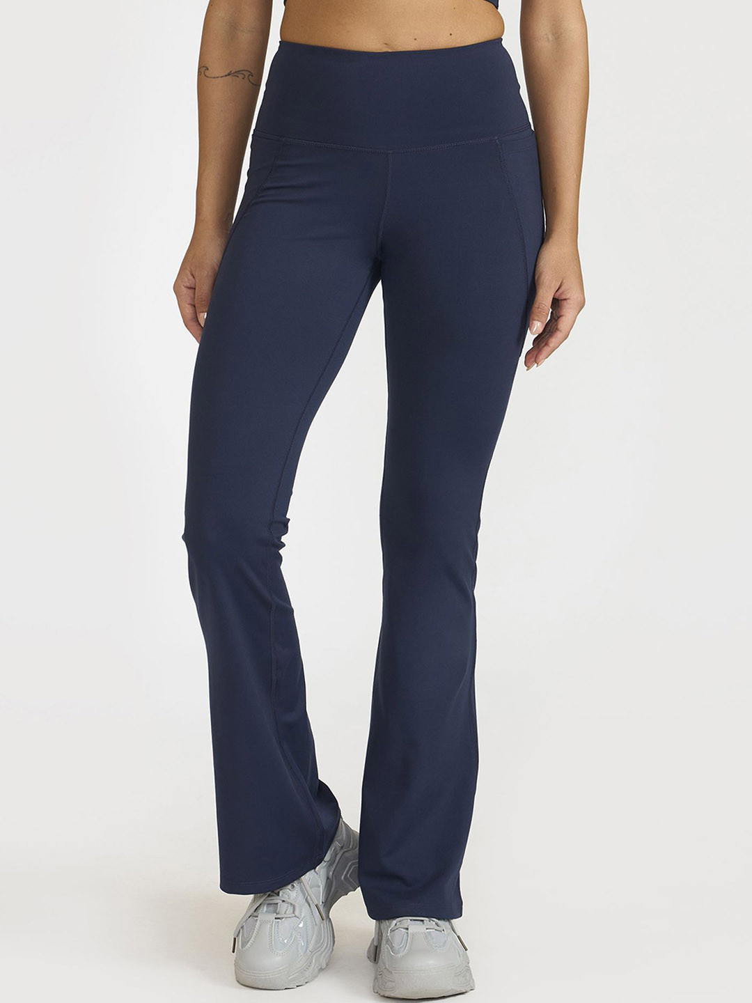 Hunnit Women Zen Regular Fit High Rise Solid Active Wear Flare Pants with Pockets