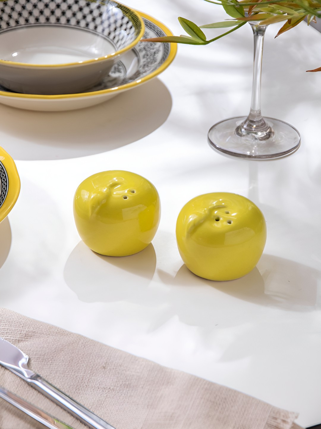 The Decor Mantra Yellow 2 Pieces Ceramic Salt and Pepper Shakers