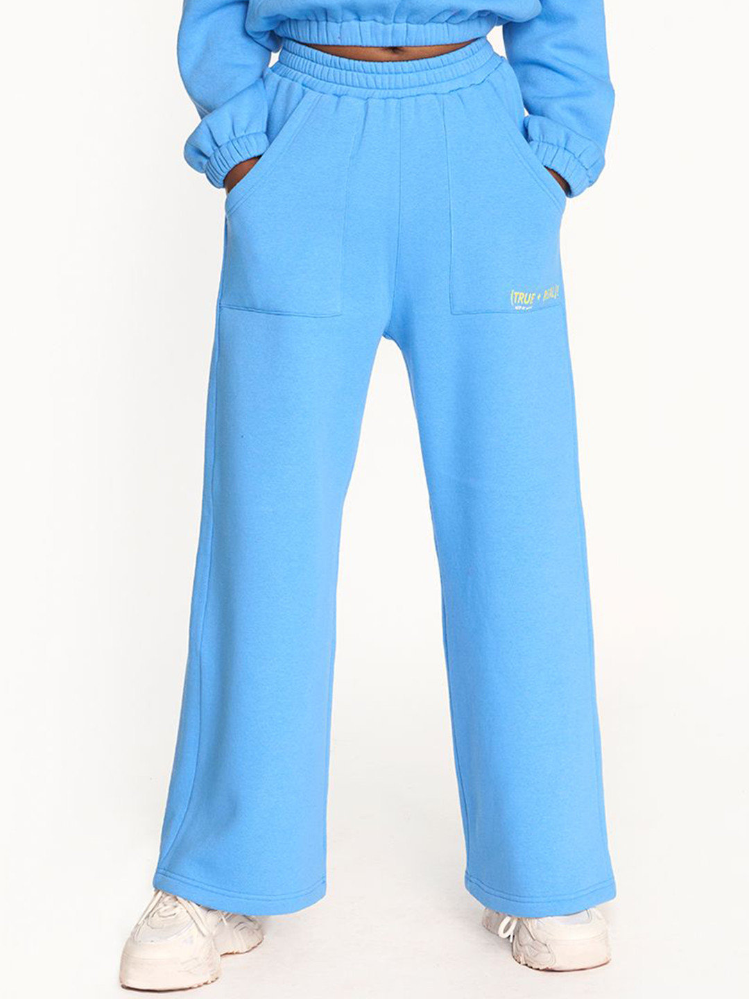 Hunnit Women Relaxed Fit Mid Rise Cotton Bell Bottom Active Wear Pants with Pockets