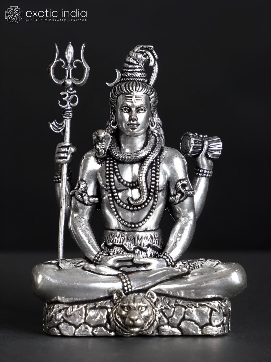 Exotic India Sitting Four Armed Lord Shiva Silver Brass Metallic Prayer Room Tiny Showpiece - 1.3 Inches
