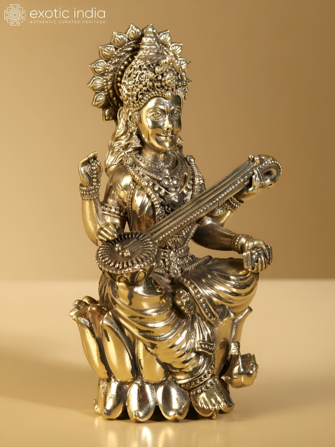 Exotic India Gold-Toned Maa Saraswati Brass Religious Idol Showpiece