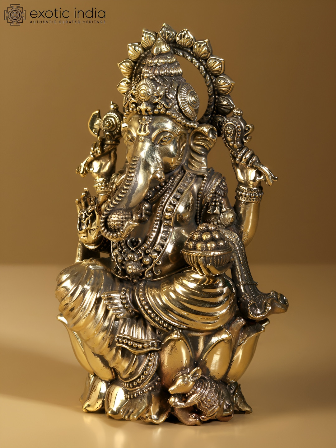Exotic India Lord Ganapati Seated On Lotus Gold Brass Metallic Prayer Room Tiny Showpiece - 2.5 Inches
