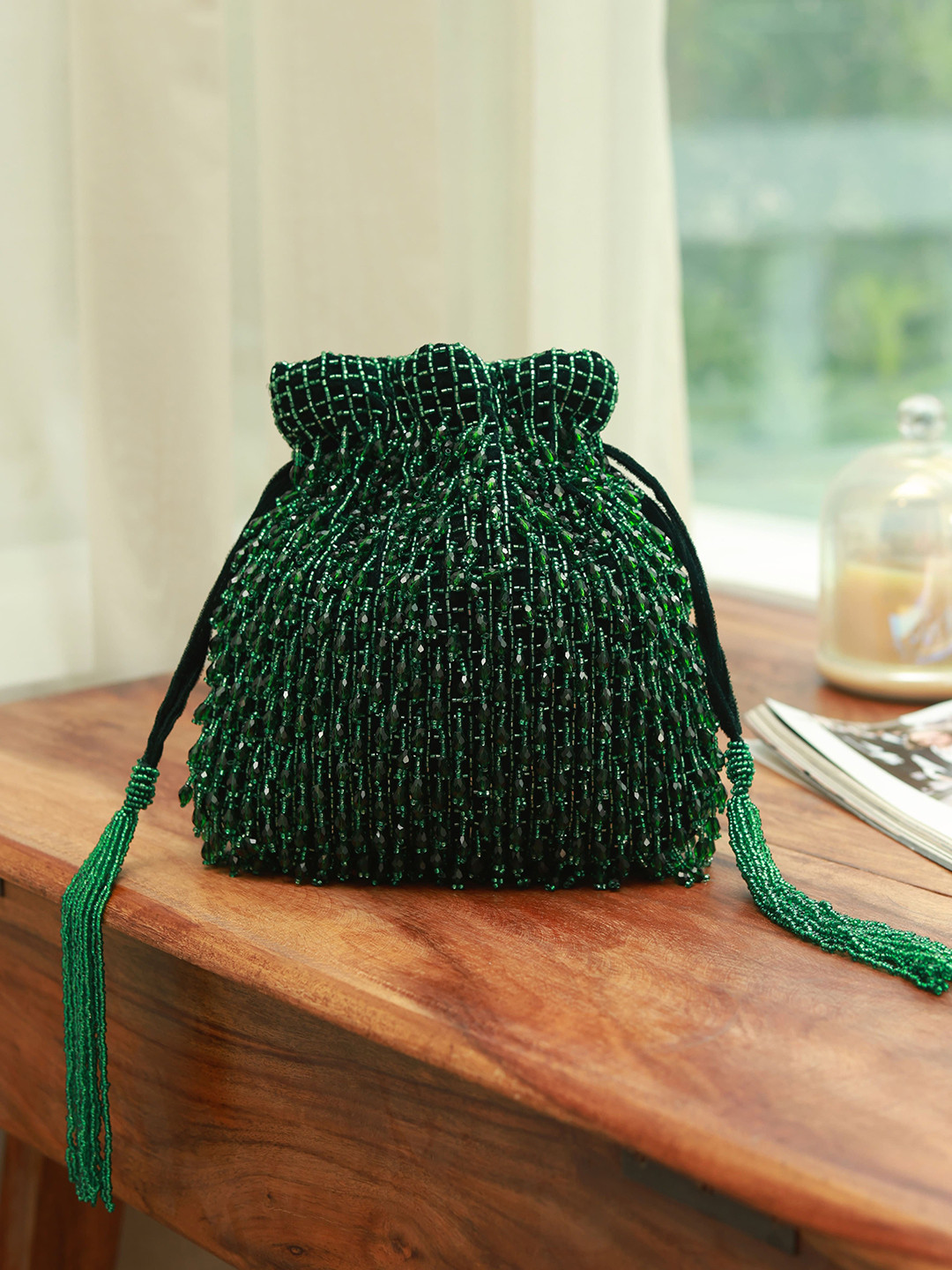 THE TAN CLAN Embroidered Tasselled Potli Clutch