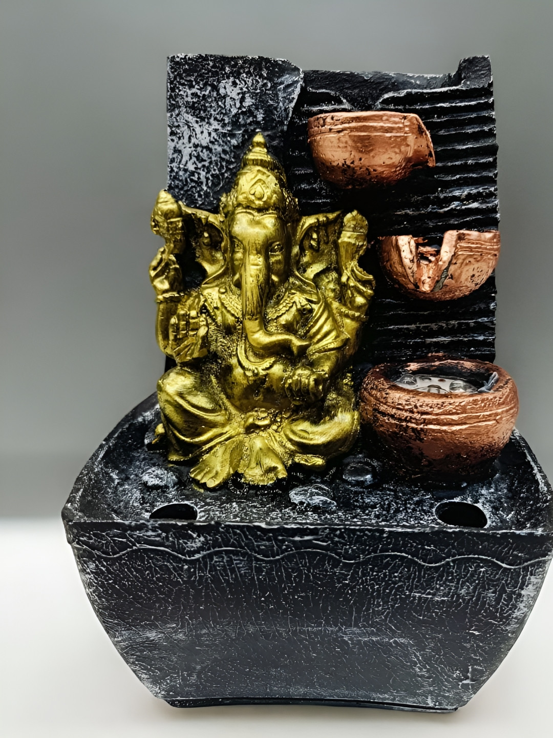 SANKALAN CREATIONS Gold-Toned & Black Religious Ganesh Idol Indoor Fountain Showpiece