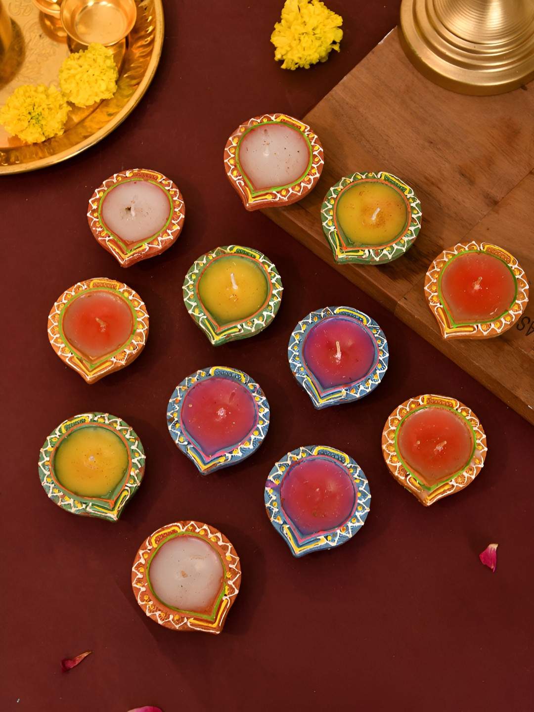 Aapno Rajasthan Red & Yellow 12 Pieces Printed Terracotta Wax Diyas