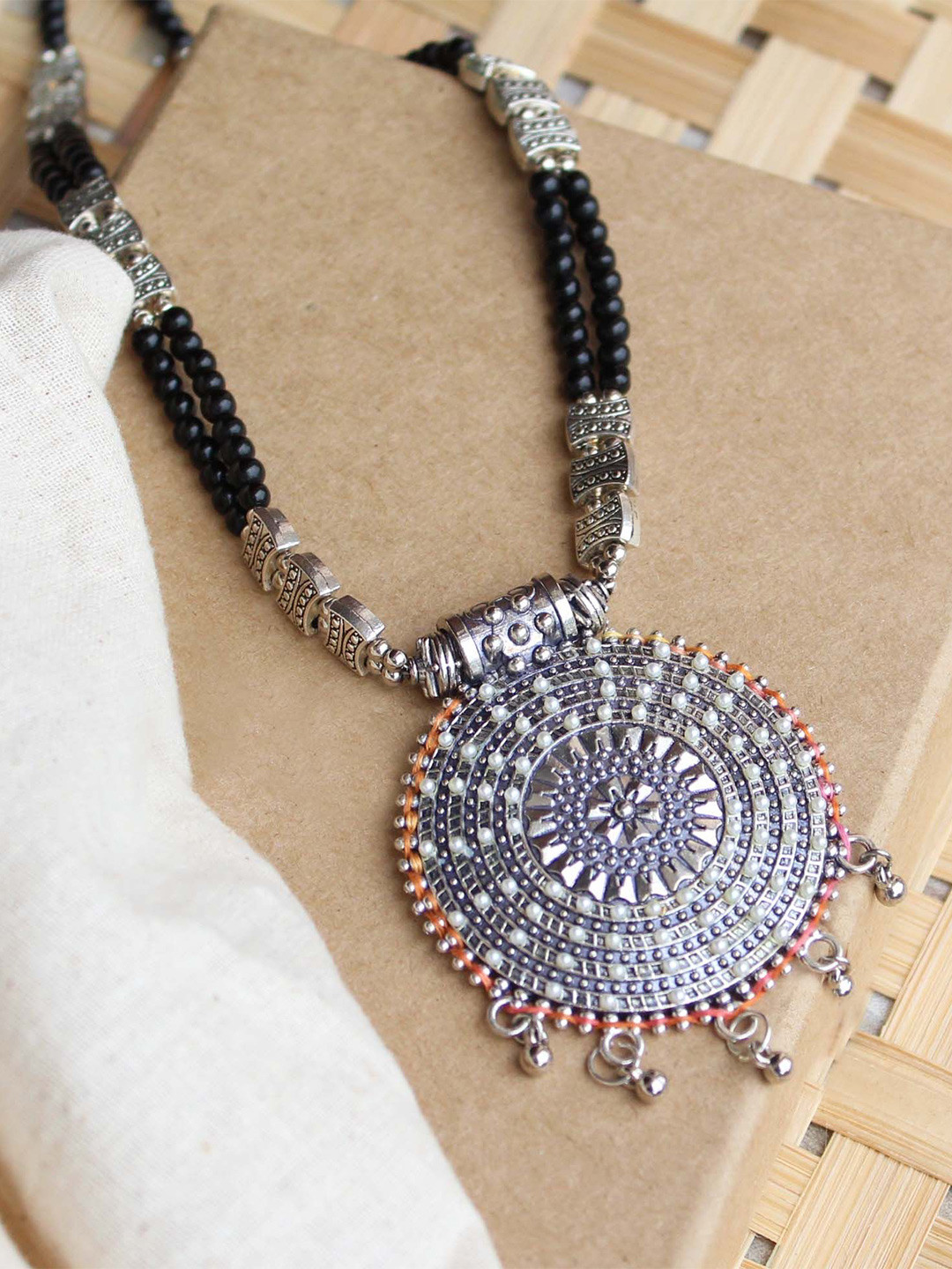 BeAbhika Silver-Plated Dana Chakra Embossed Necklace