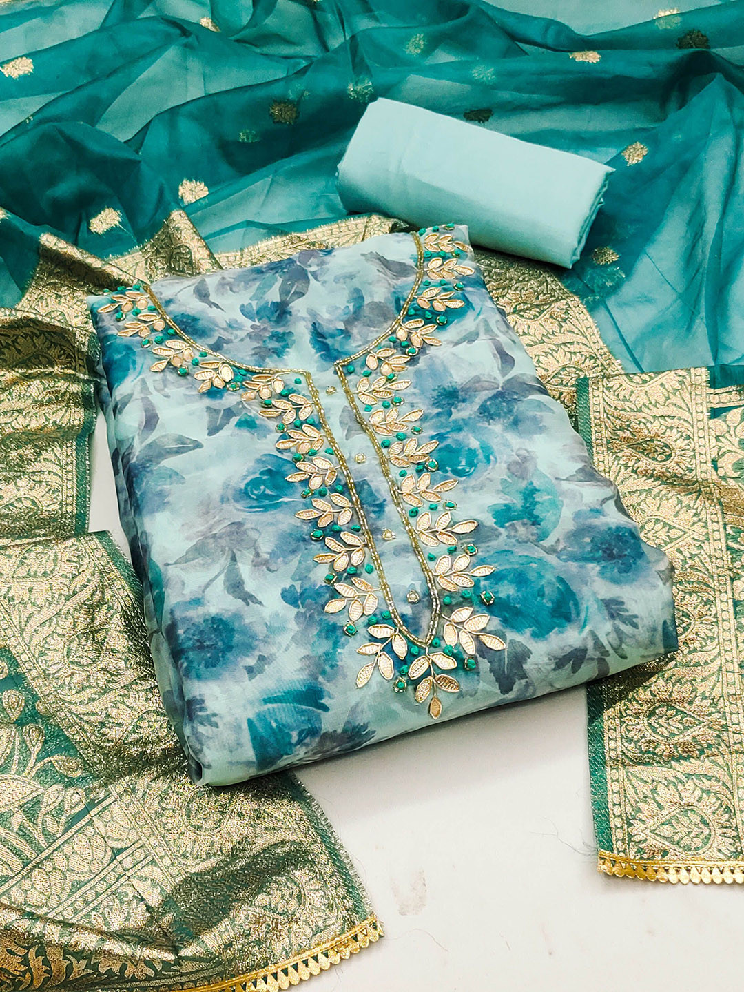 Ishin Blue Floral Embroidered Beads and Stones Organza Unstitched Dress Material