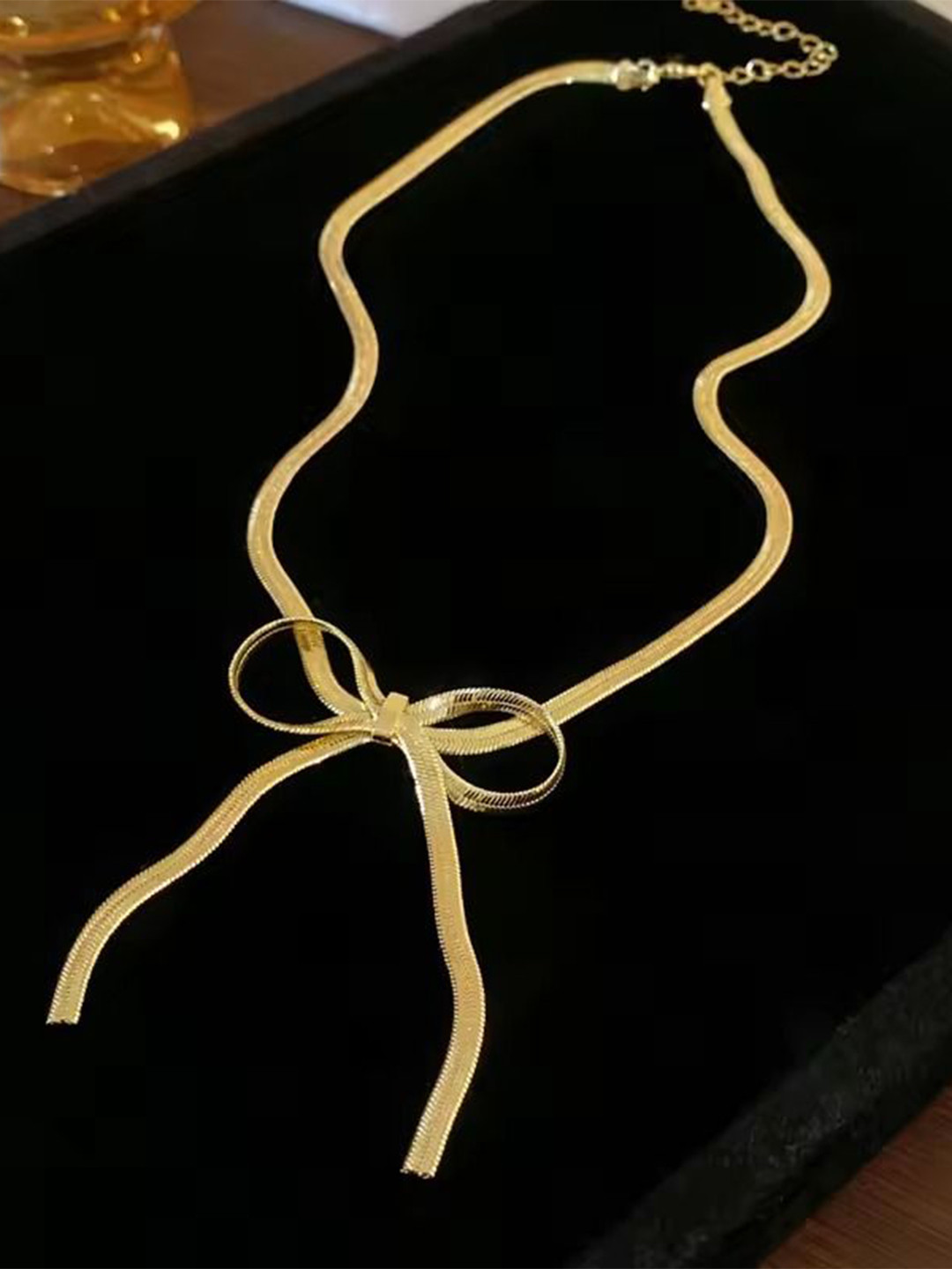 MEENAZ Stainless Steel Gold-Plated Bow Necklace