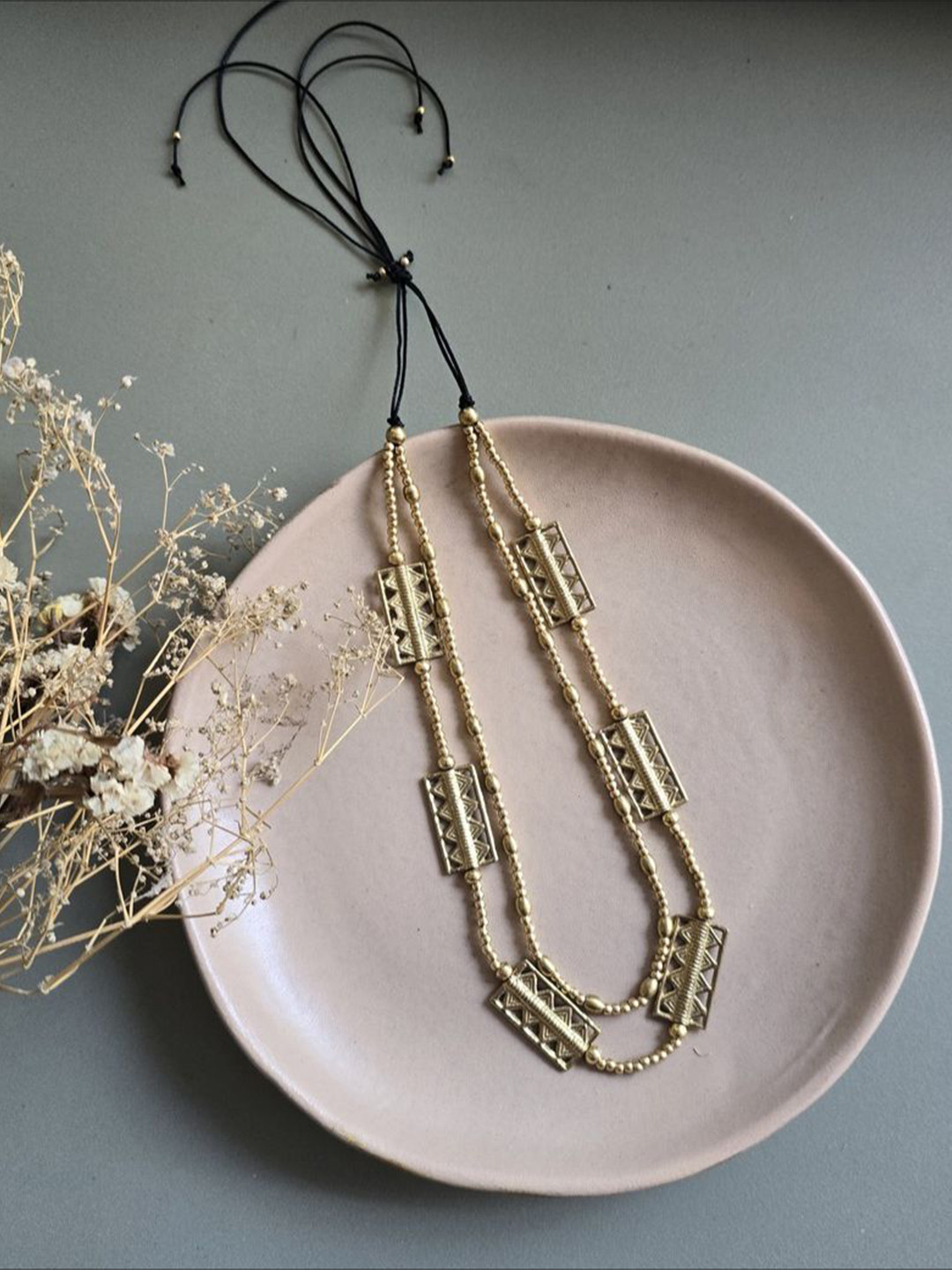 Studio Anviksha Brass beads and charms layered statement necklace