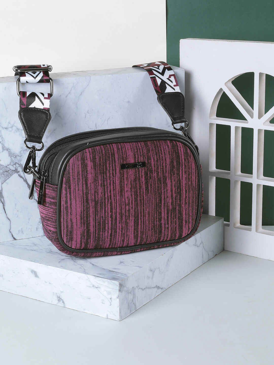 Metro Women Self Design Handbags