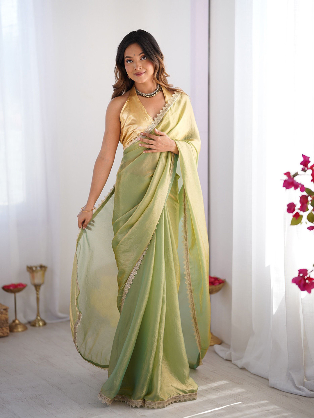 Kalista Solid Sequinned Pastel Saree