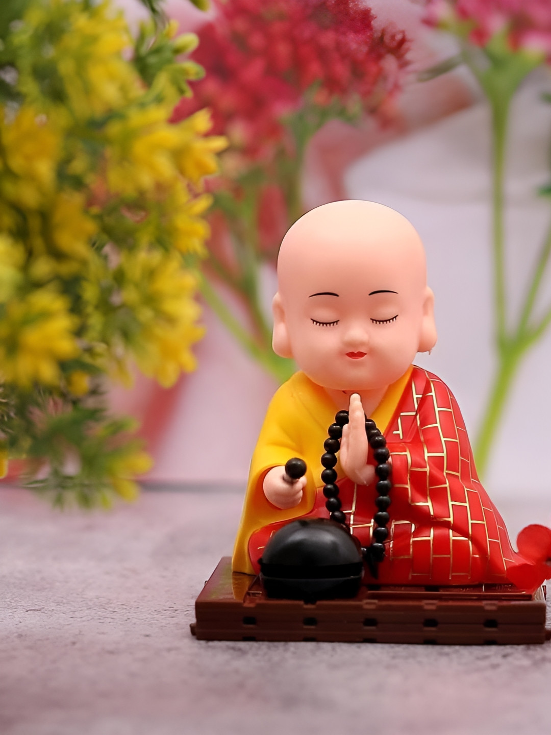 DeoDap Solar Powered Sitting Buddha Red Plastic Natural Living Room Small Showpiece - 3.9 Inches