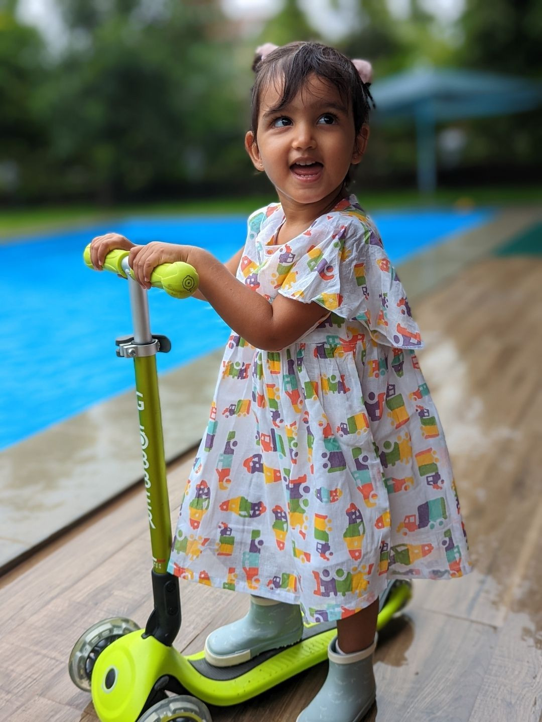 Tura Turi Girl Cotton Print Round Neck Flared Sleeves Empire Dress