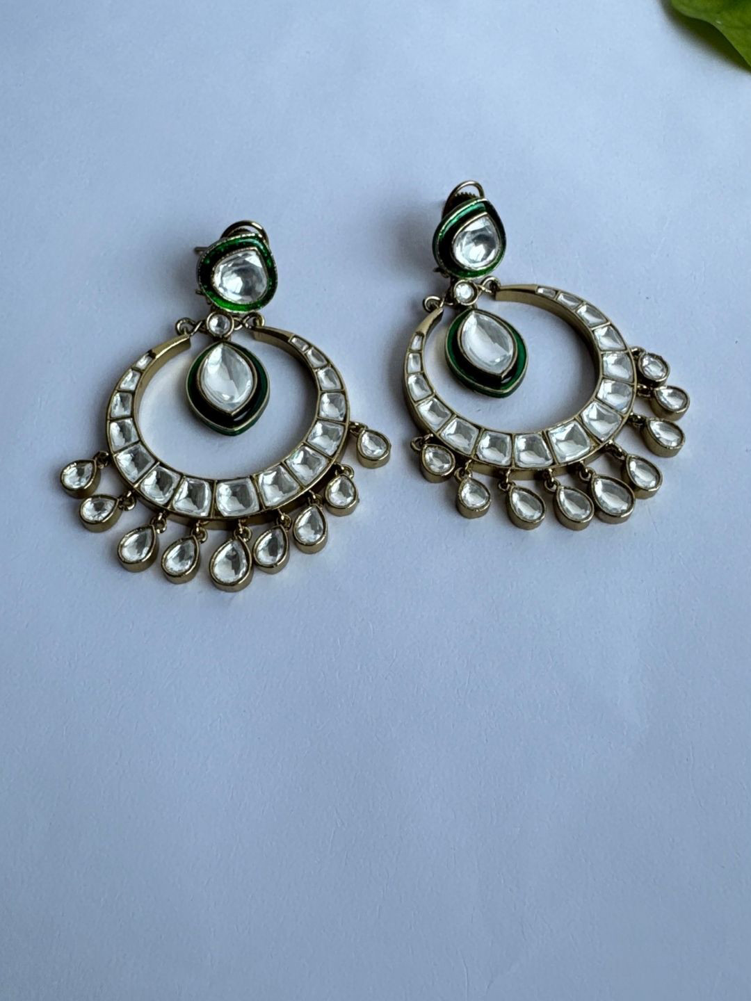 The Jewellery Tale Stainless Steel Gold-Plated Stones Studded Crescent Shaped Chandbalis