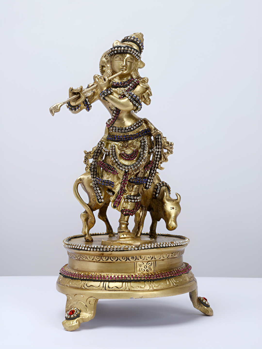 Exotic India Cow Krishna Gold Brass Metallic Prayer Room Medium Showpiece - 10.7 Inches