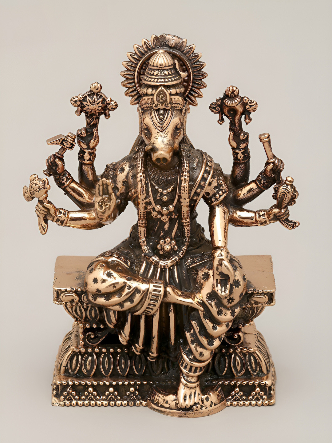 Exotic India Eight Armed Sitting Goddess Varahi Gold Brass Metallic Prayer Room Medium Showpiece - 2 Inches