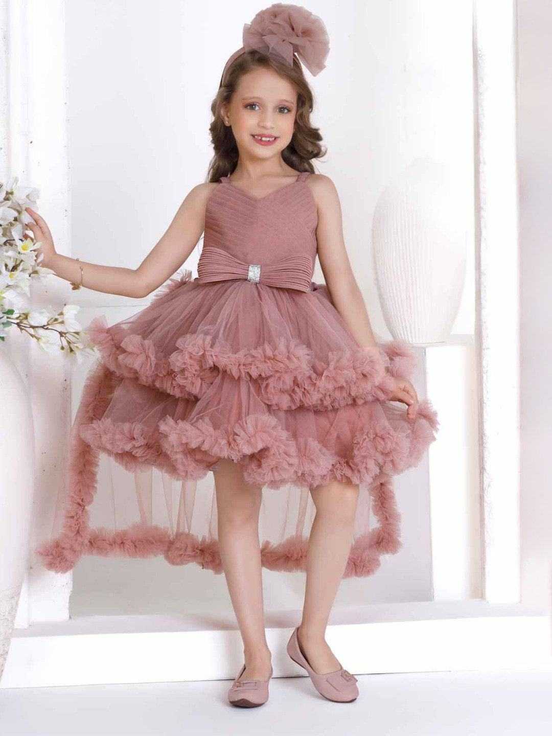 Lagorii Girls Sleeveless And Ruffled With Bow Embellished Party Wear Net Frock