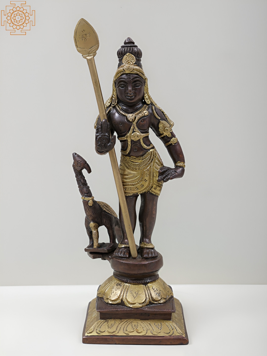 Exotic India Standing Lord Karttikeya with Peacock Gold Brass Metallic Prayer Room Medium Showpiece - 10 Inches