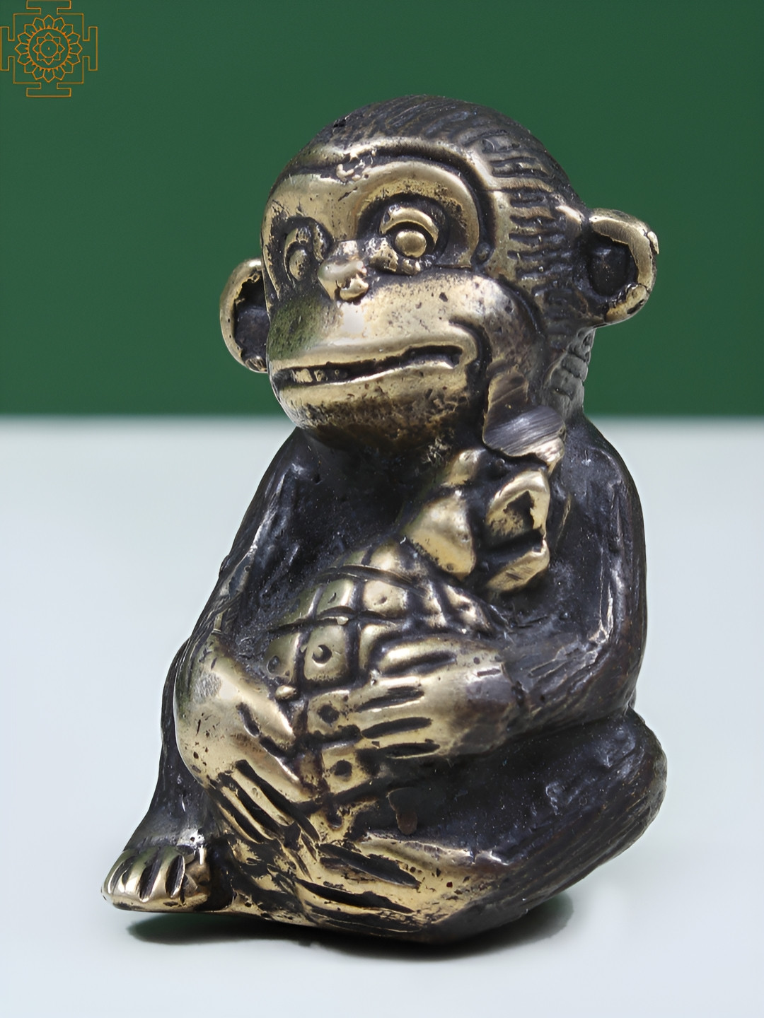 Exotic India Baby Monkey Holding A Pineapple on Head Black Brass Metallic Living Room Tiny Showpiece - 1.8 Inches