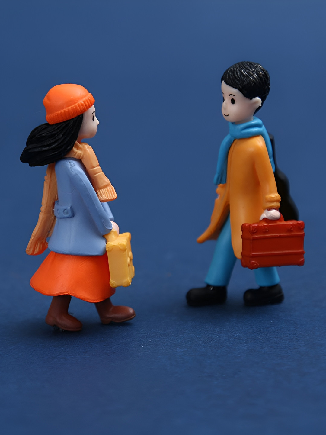 Spiaty Romantic Winter Couple Orange Polyresin Glossy Prayer Room Set of 2 Medium Showpieces - 2.2 Inches