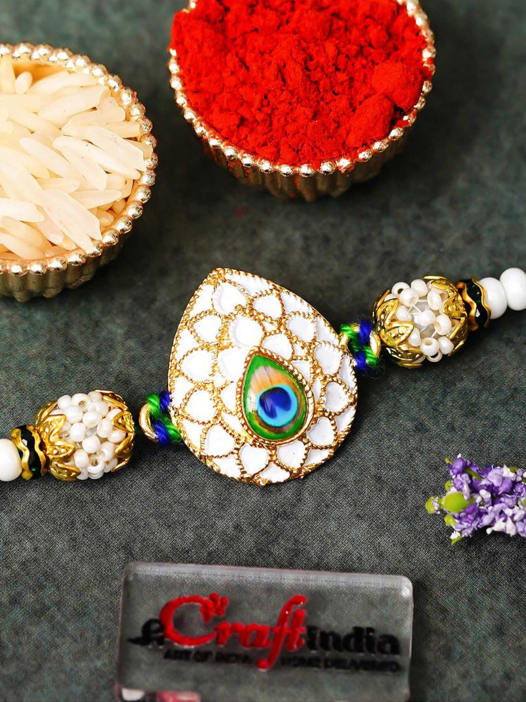 eCraftIndia Peacock Feather Pearls Designer Thread Rakhi