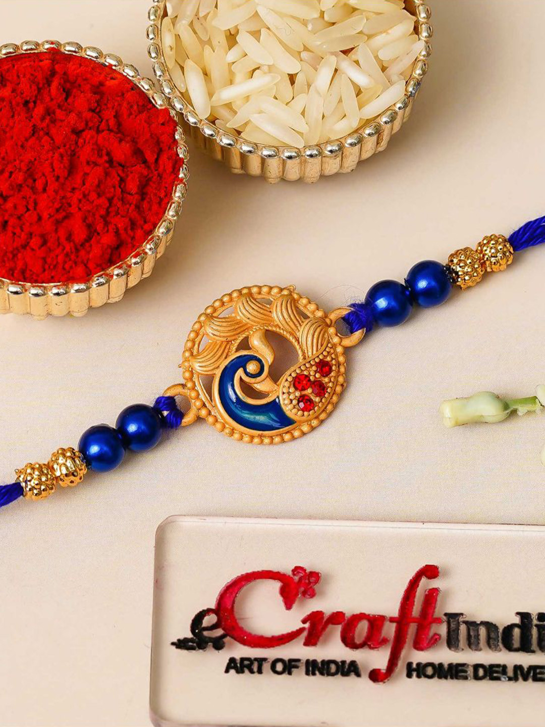 eCraftIndia Peacock Shaped Thread Rakhi