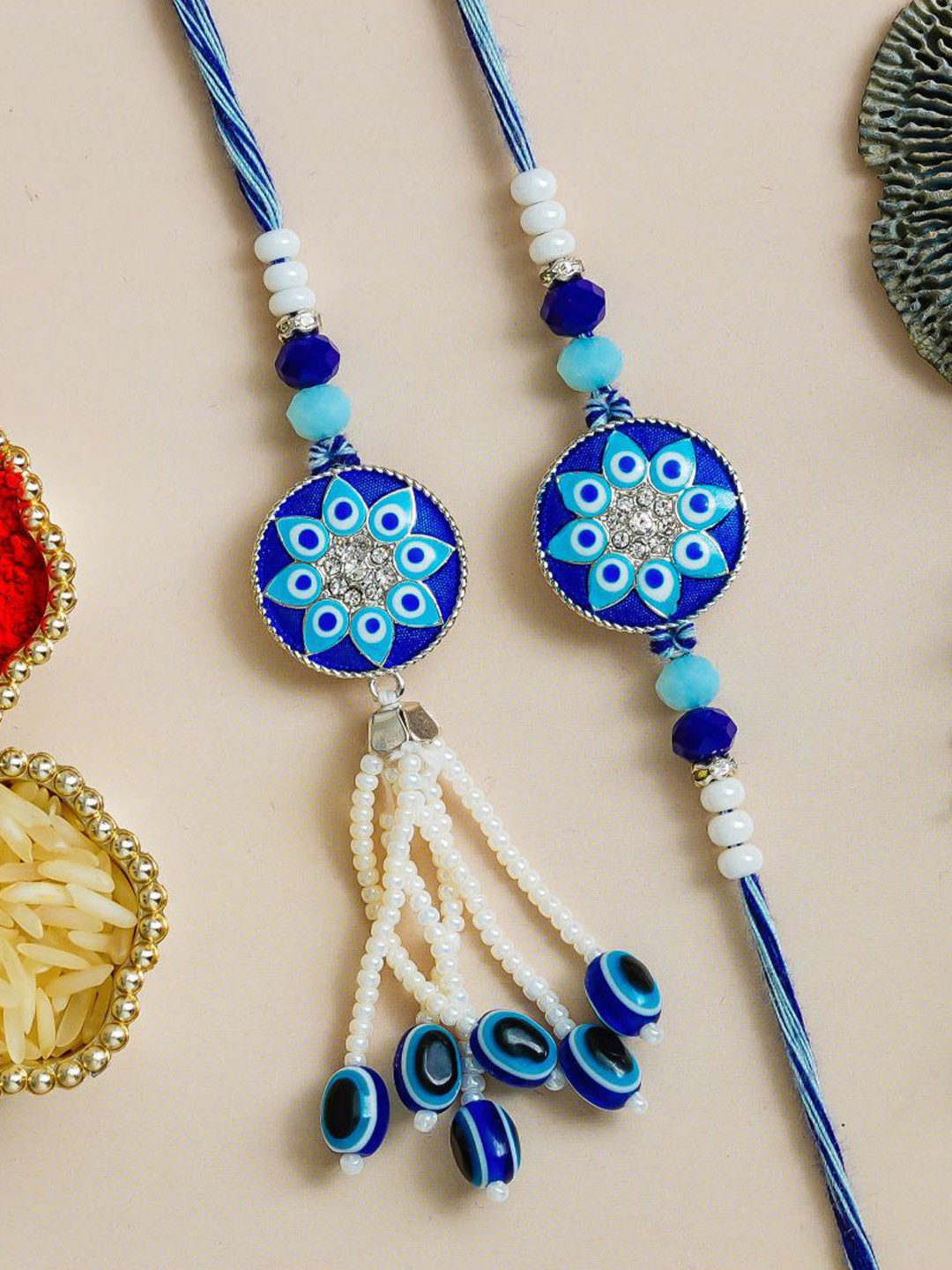eCraftIndia Set of 2 Floral Evil Eye Designer Thread Brother Rakhi