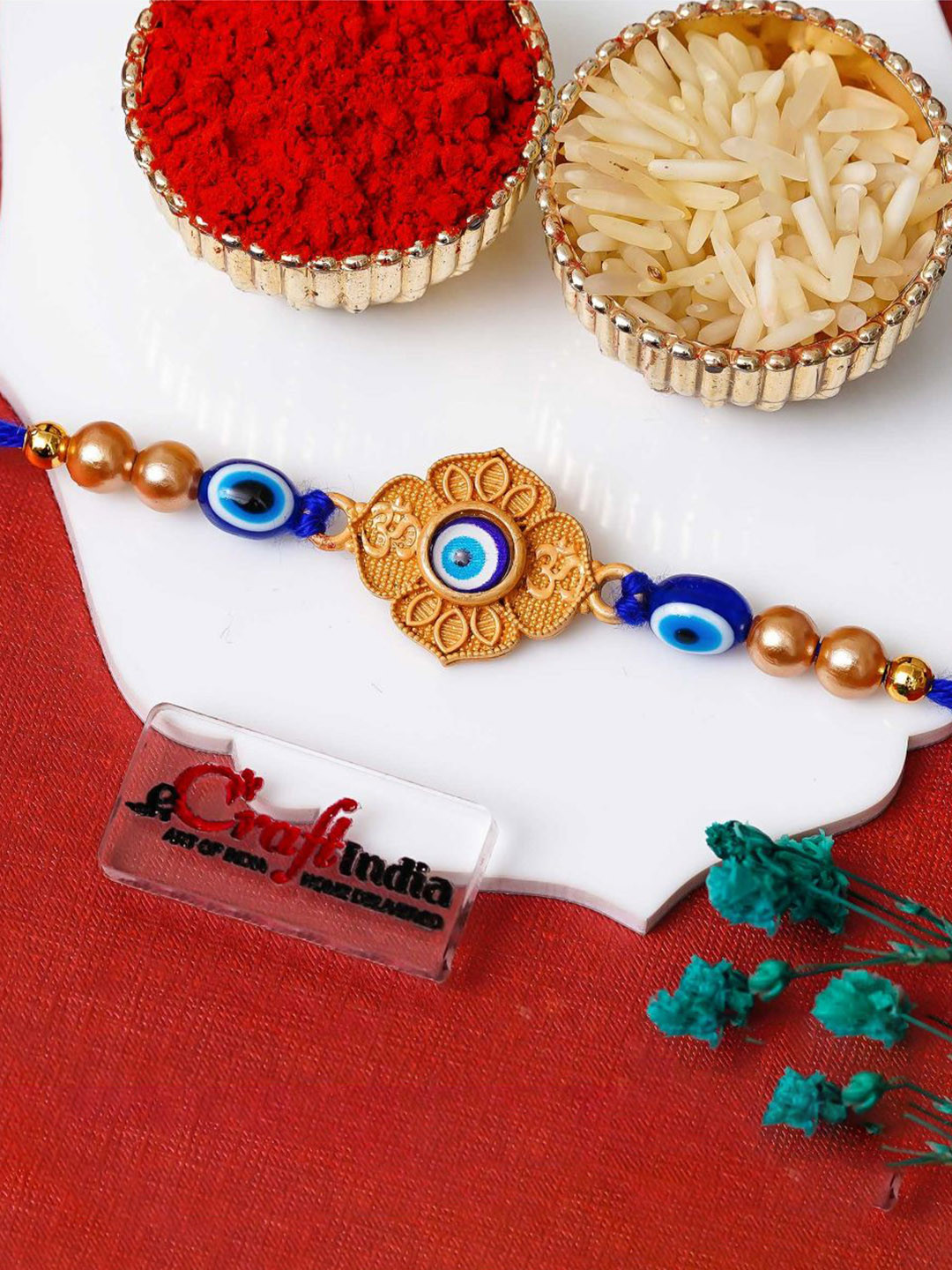 eCraftIndia Om Floral Evil Eye Thread Brother Rakhi