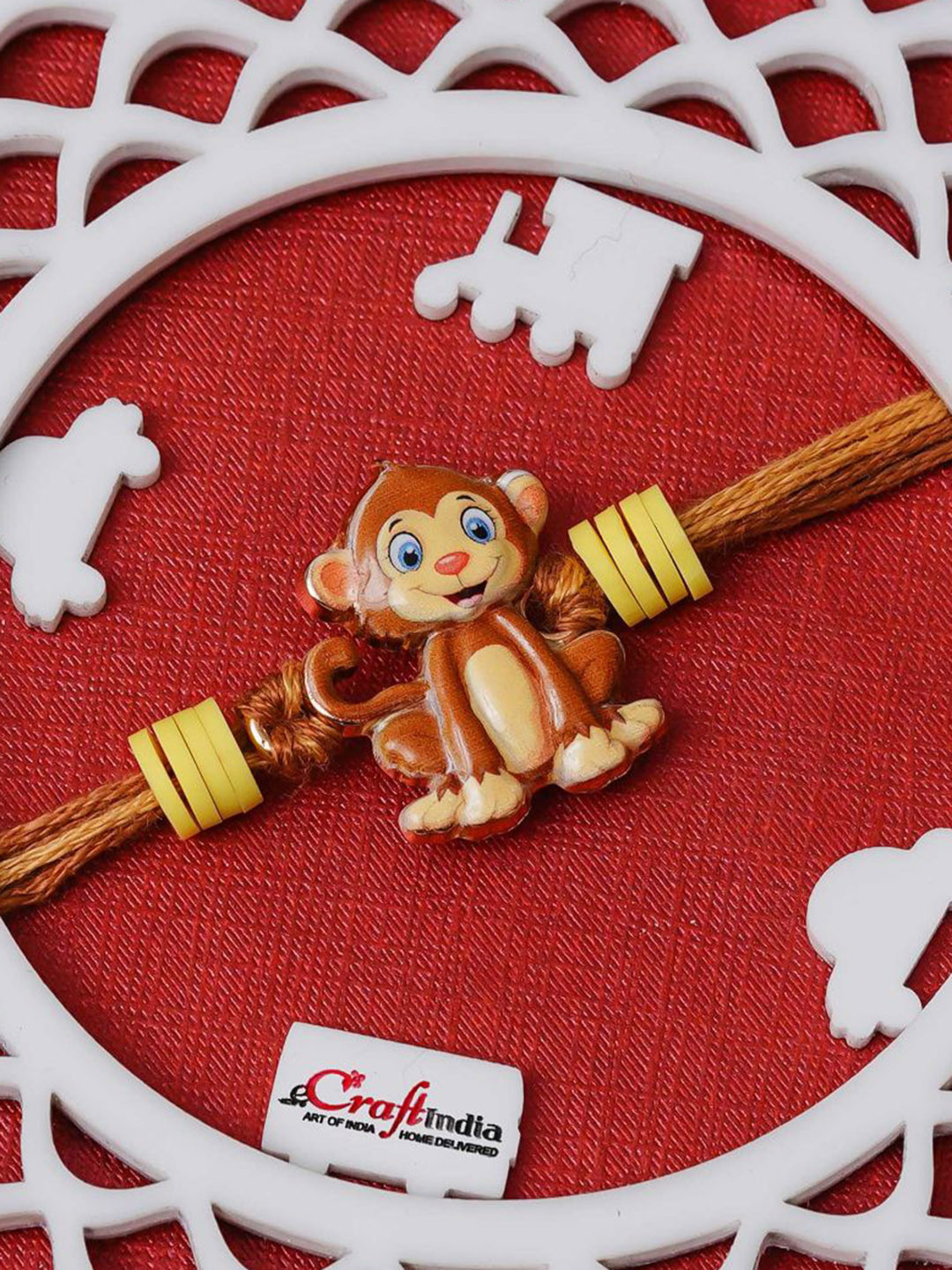 eCraftIndia Artfificial Stones Studded And Beaded Monkey Cartoon Rakhi
