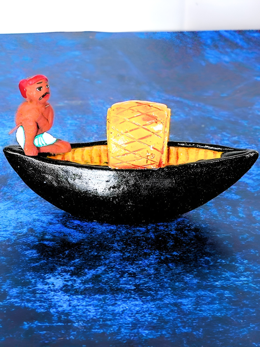 PujaNPujari Bommai Clay Boatman On Boat Brown Ceramic Matte Living Room Medium Showpiece - 3.9 Inches