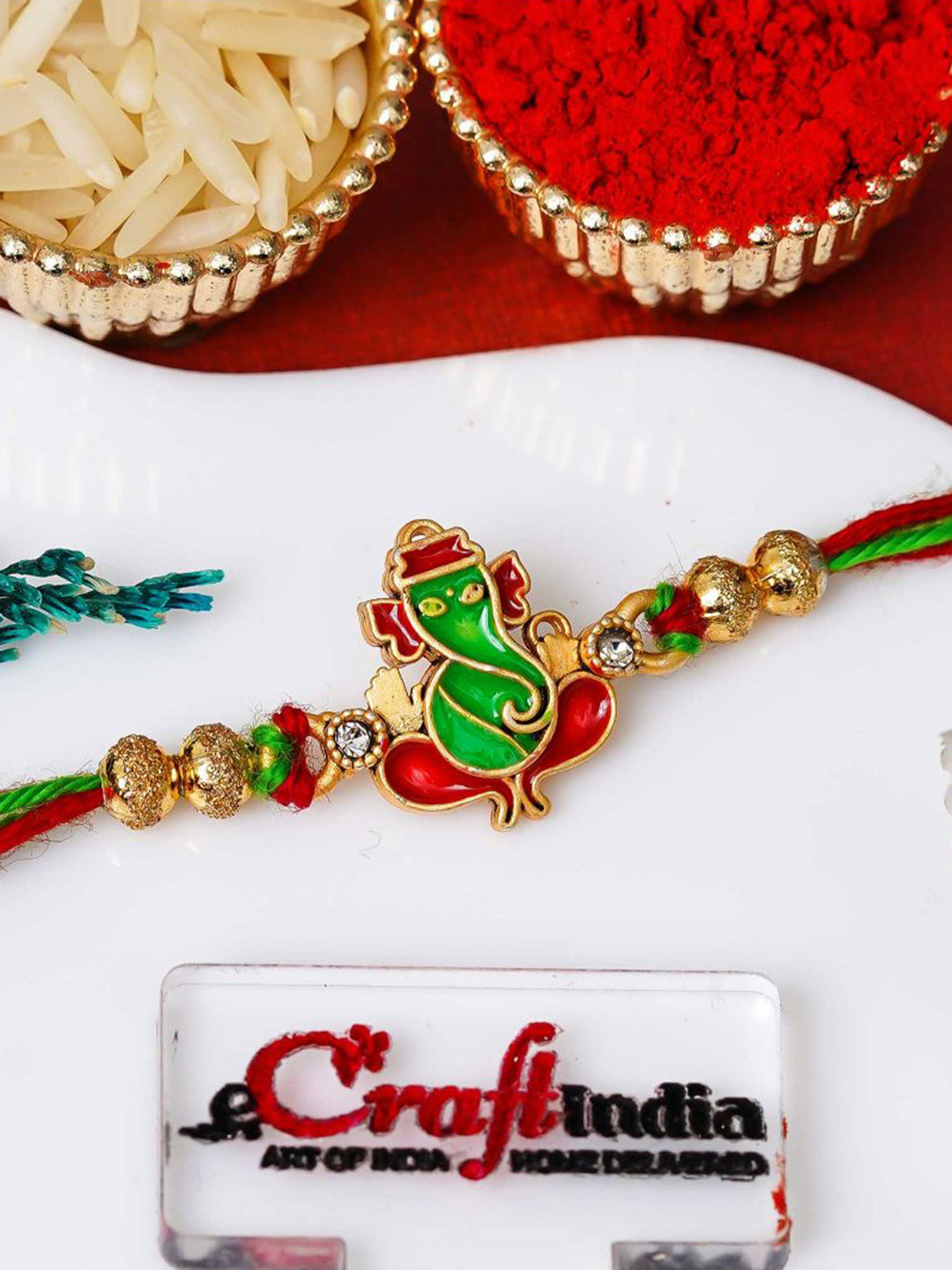 eCraftIndia Blessing Lord Ganesha Thread Rakhi With Roli Chawal