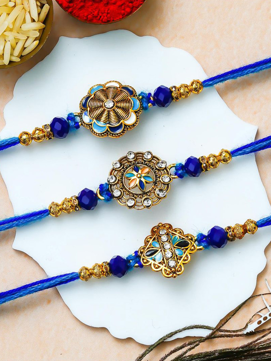 eCraftIndia Set of 3 Blue Golden Floral Designer Brother Rakhis