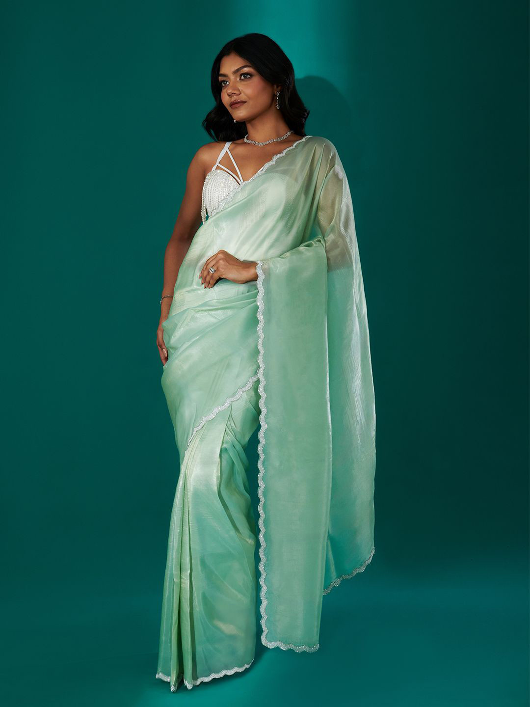 TEEJH Kaanch Green Shimmer Tissue Saree