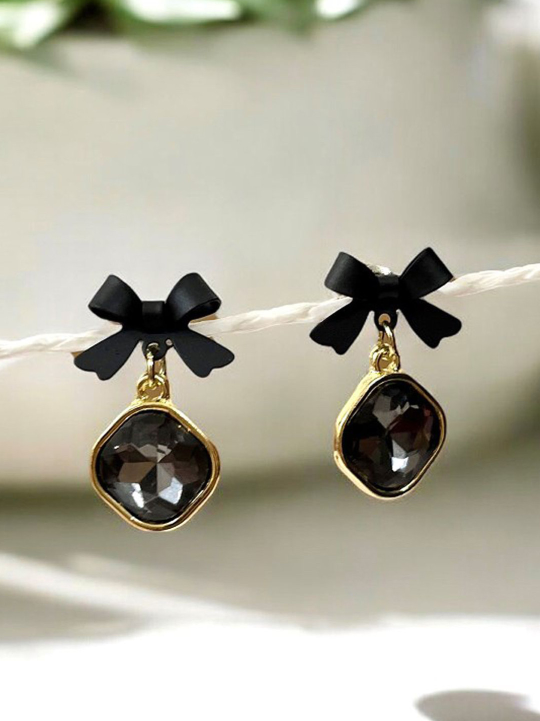 FIMBUL Gold-Plated Crystals Studded Diamond & Bow Shaped Drop Earrings