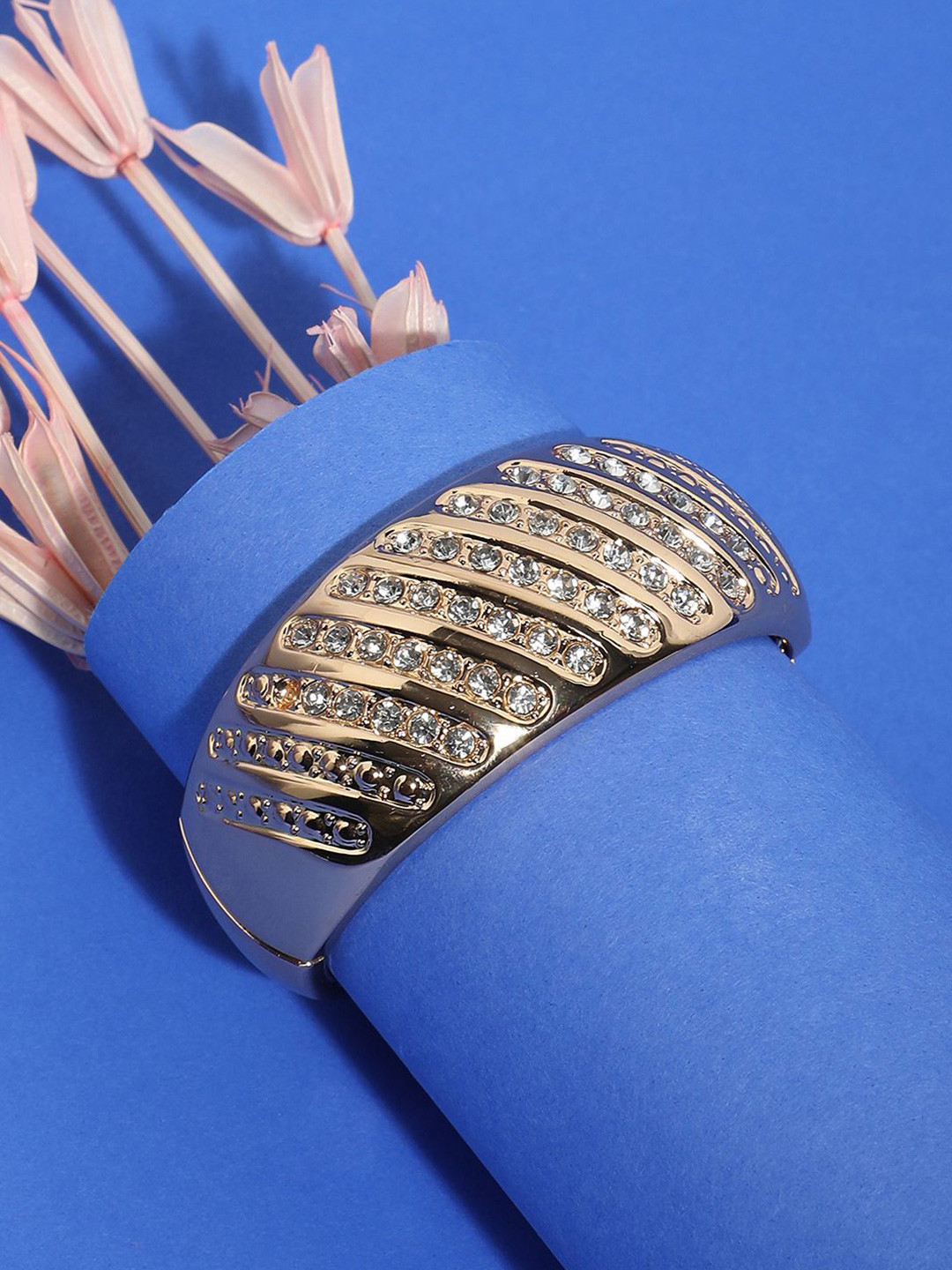 DressBerry Gold-Plated Stone Studded Twisted Lined Bangle-Style Bracelet