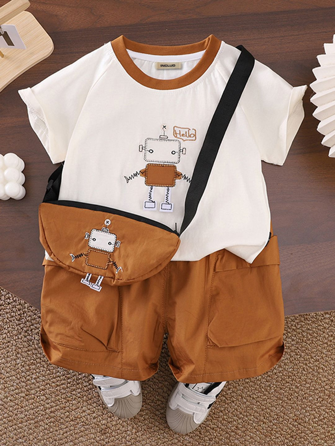 INCLUD Boys Graphic Printed T-Shirt With Cargo Shorts & Sling Bag