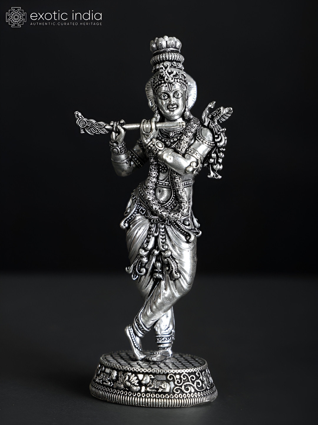 Exotic India Standing Lord Krishna Playing Flute Silver Brass Metallic Prayer Room Small Showpiece - 7.5 Inches