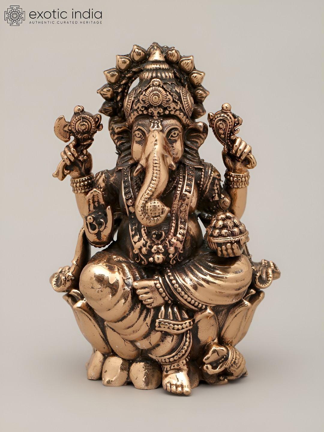 Exotic India Ekadanta Ganesha Rose Gold Brass Metallic Prayer Room Tiny Showpiece - 3.5 Inches