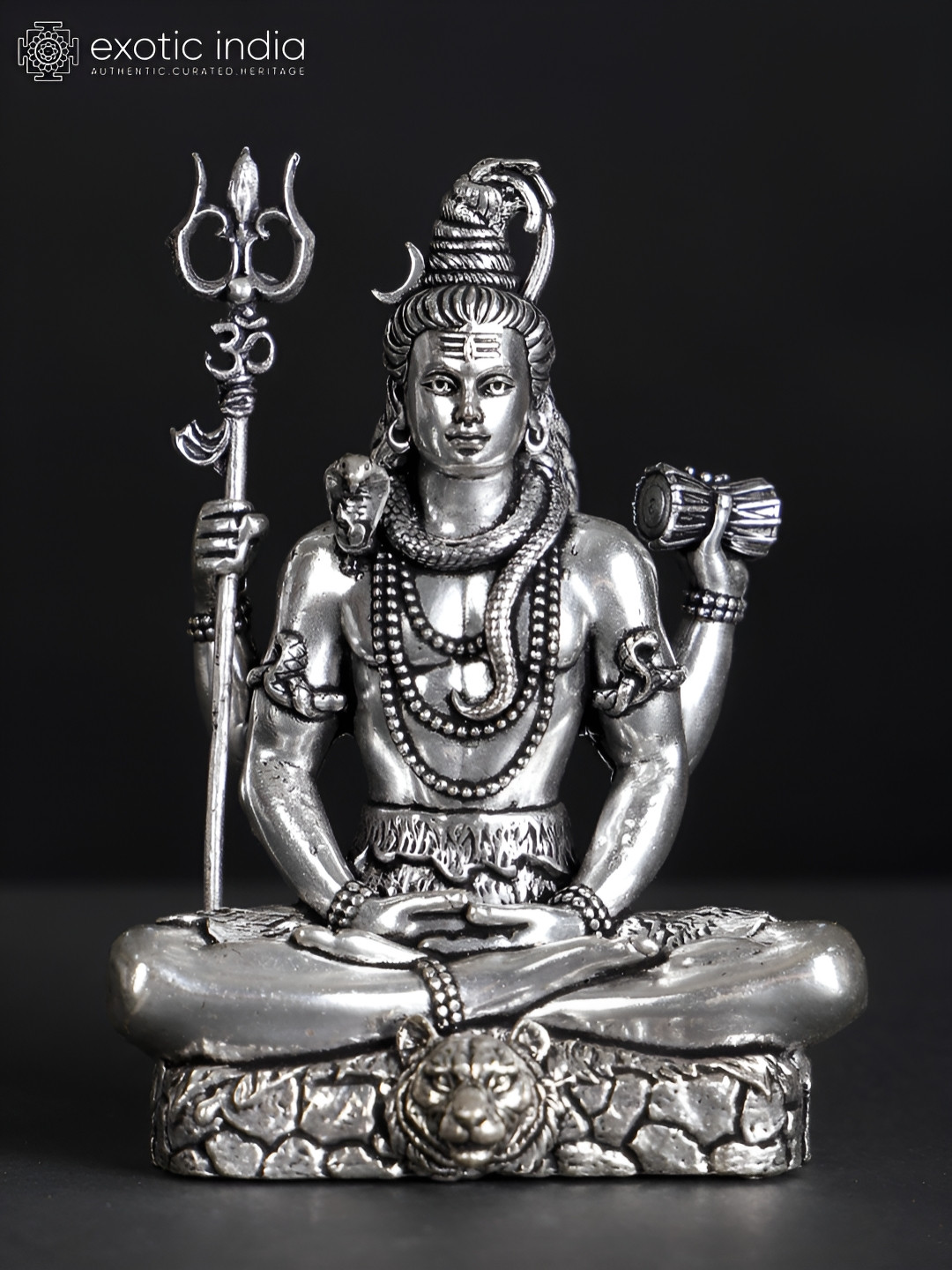Exotic India Sitting Four-Armed Lord Shiva Silver Brass Metallic Prayer Room Small Showpiece - 7 Inches