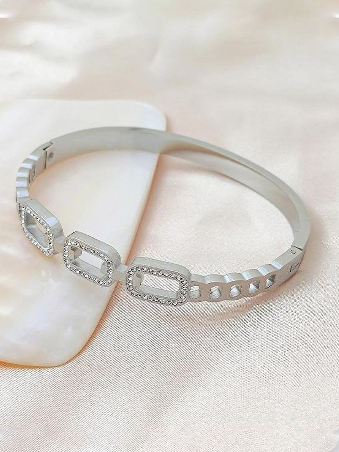 MYKI Stainless Steel Silver-Plated Artificial Stones Studded Bangle Type Bracelet