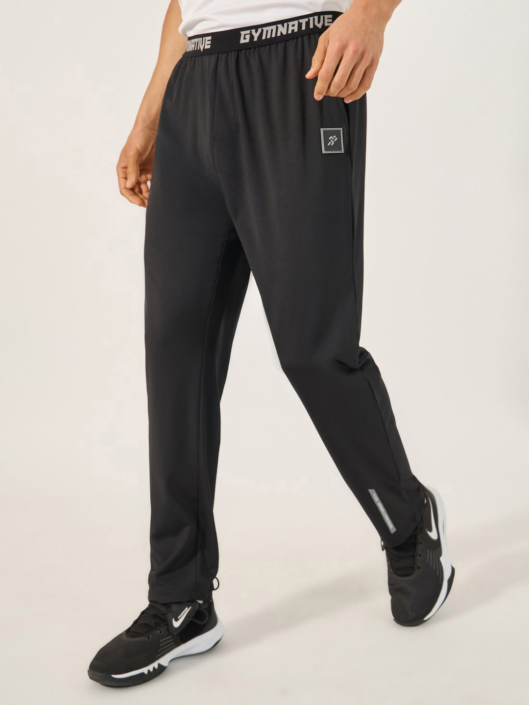 Styli Men Training Reflective Print Badge detail Slim Fit Track Pants