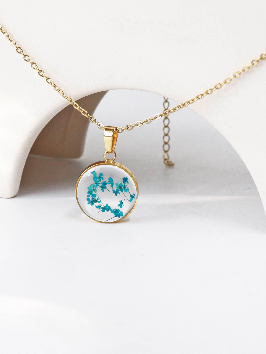 Varico Gold-Plated Stainless Steel Floral Resin Circular Shaped Pendant With Chain