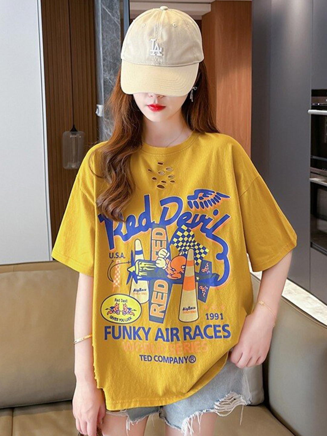 StyleCast Yellow Graphic Printed Cut Out Detail Cotton Top