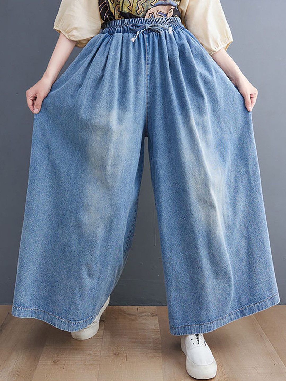 StyleCast x Revolte Women Flared Cotton Light Fade Jeans