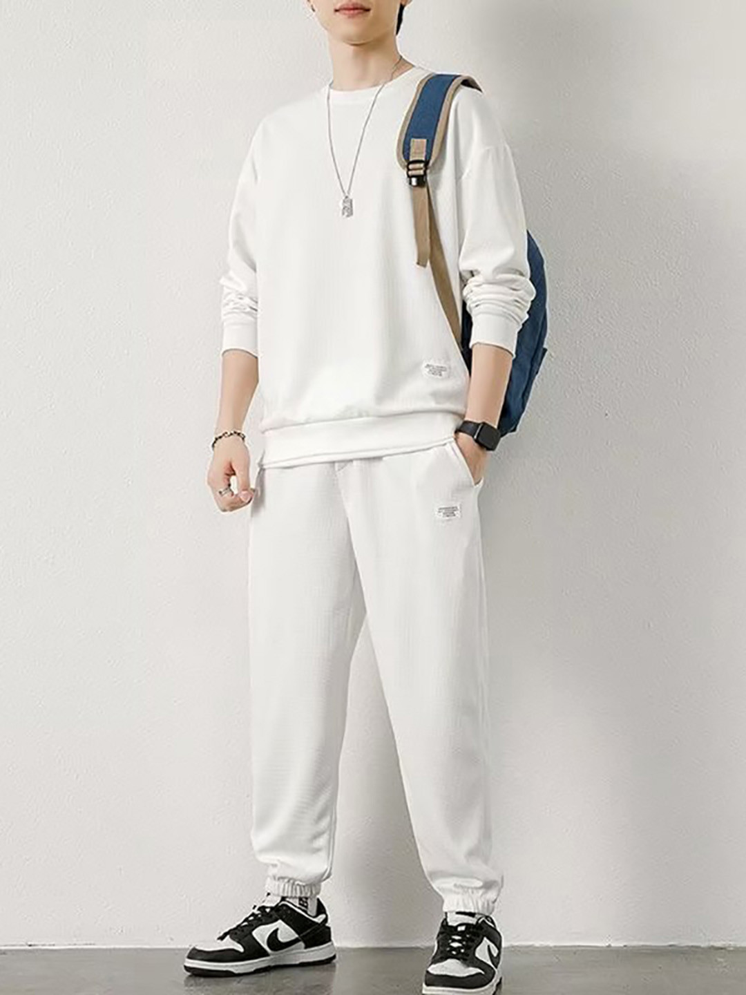 StyleCast x Revolte White V-Neck Tracksuits