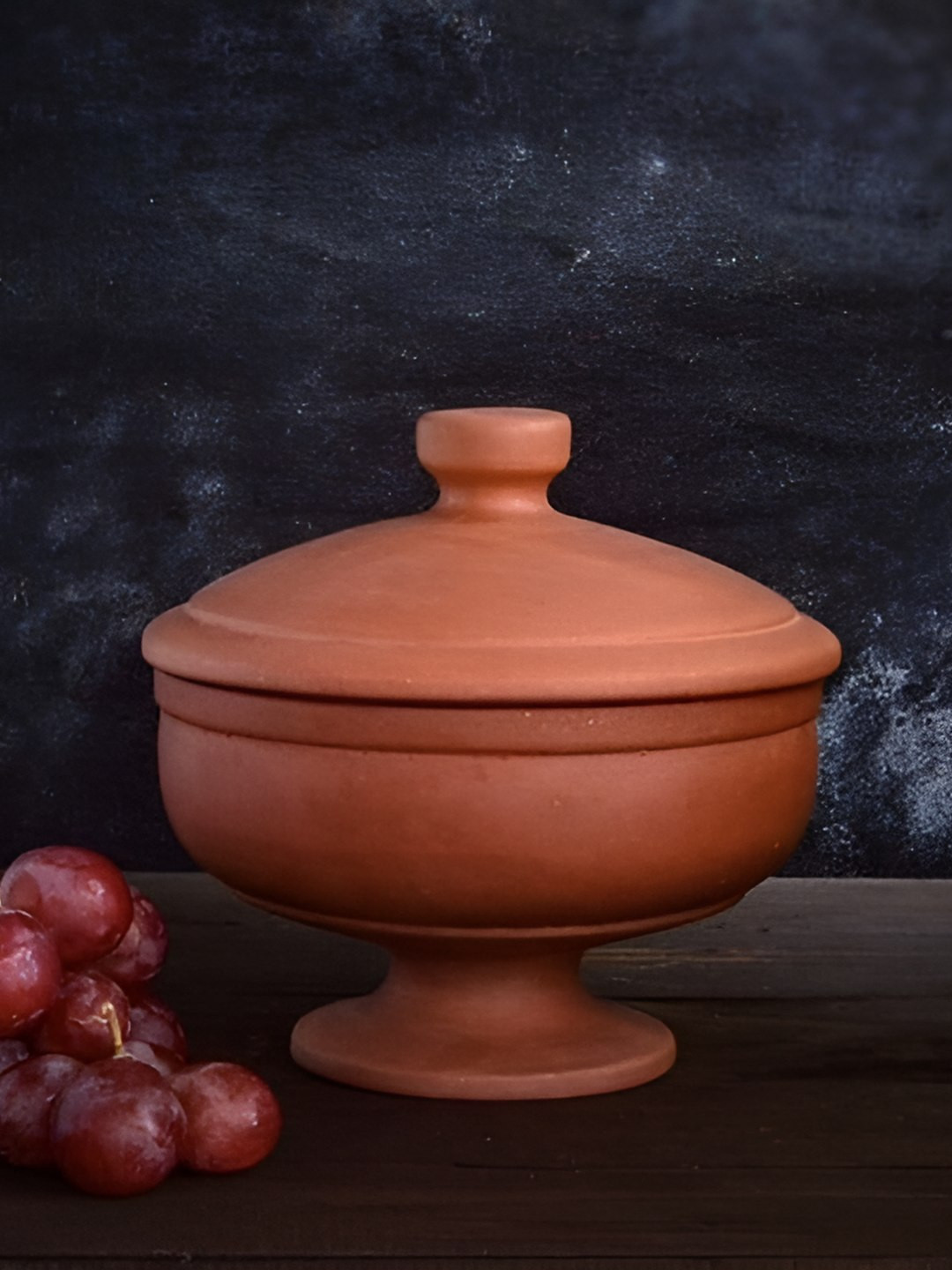 The handicraftian Orange Terracotta Medium Serving Handi With Joint Stand-900-950 ml